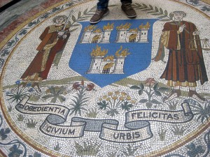 A mosaic on the floor of the city hall.
