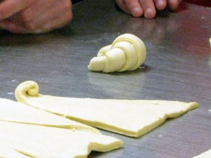The triangles are then rolled into croissants!